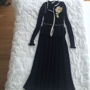 SOLD. Moschino Sweater with hand crocheted flower